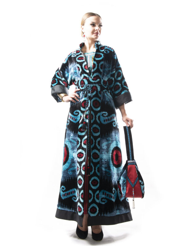 This robe is crafted from sumptuous silk ikat velvet fabric, adorned with a captivating combination of two velvet patterns. The intricate blend of textures and patterns creates a visually stunning and unique design that will make you feel like royalty.