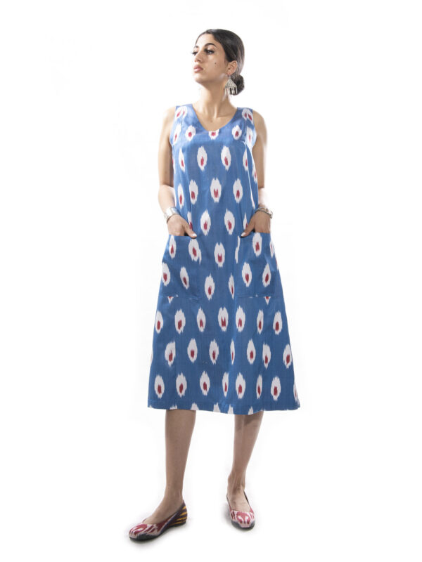 Ikat Elegance: This Silk Ikat Pocket Dress is a testament to luxury and style. The captivating ikat patterns, a representation of traditional craftsmanship, adorn the fabric, creating a visually captivating and unique garment.