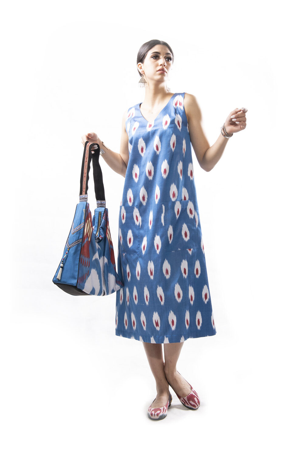 Ikat Elegance: This Silk Ikat Pocket Dress is a testament to luxury and style. The captivating ikat patterns, a representation of traditional craftsmanship, adorn the fabric, creating a visually captivating and unique garment.