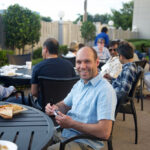 Andrea from Italy enjoying pizza